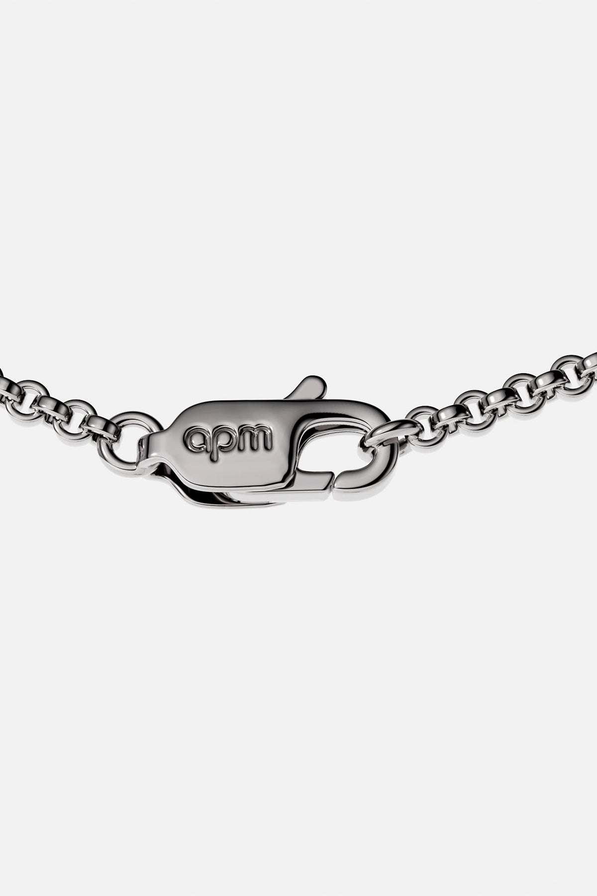 APM MONACO silver bracelet with a clasp on a white background