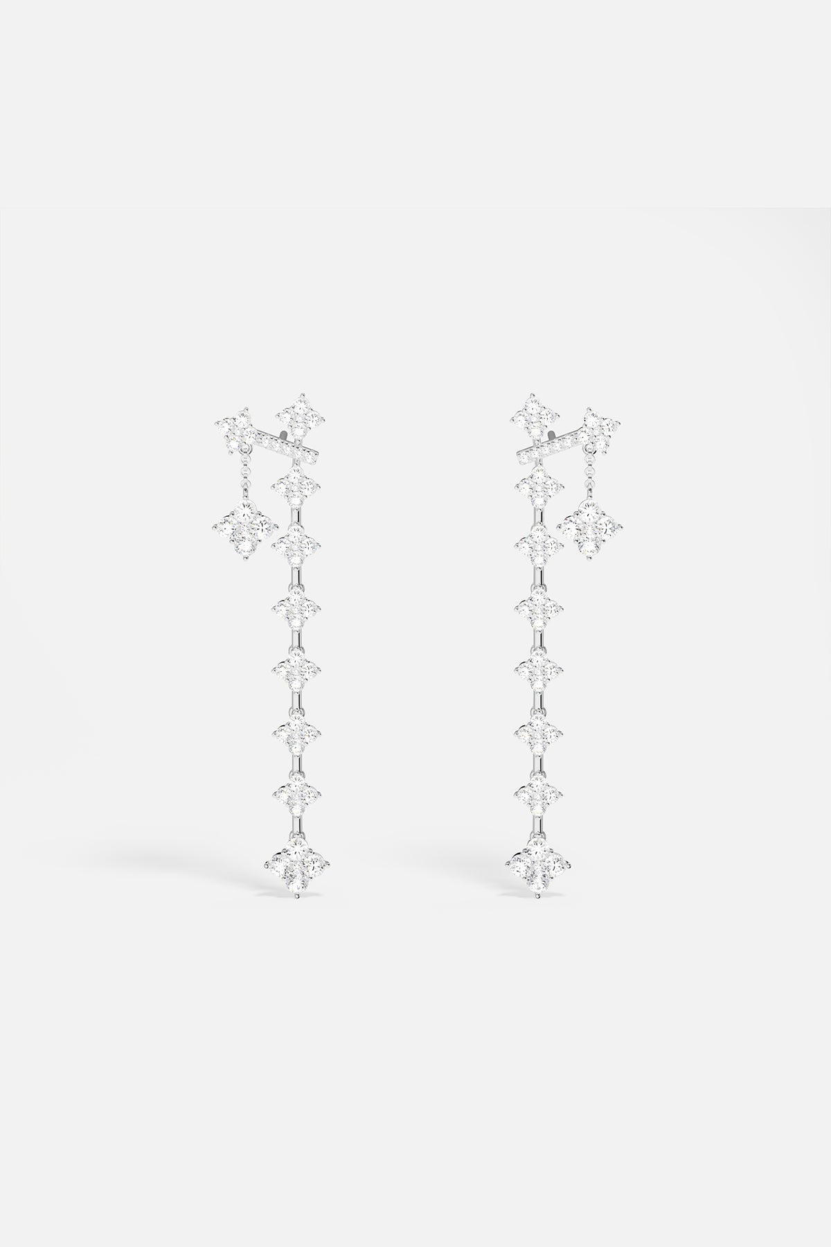 Earrings APM Monaco: silver-tone crystal drop earrings with pavé crystals.