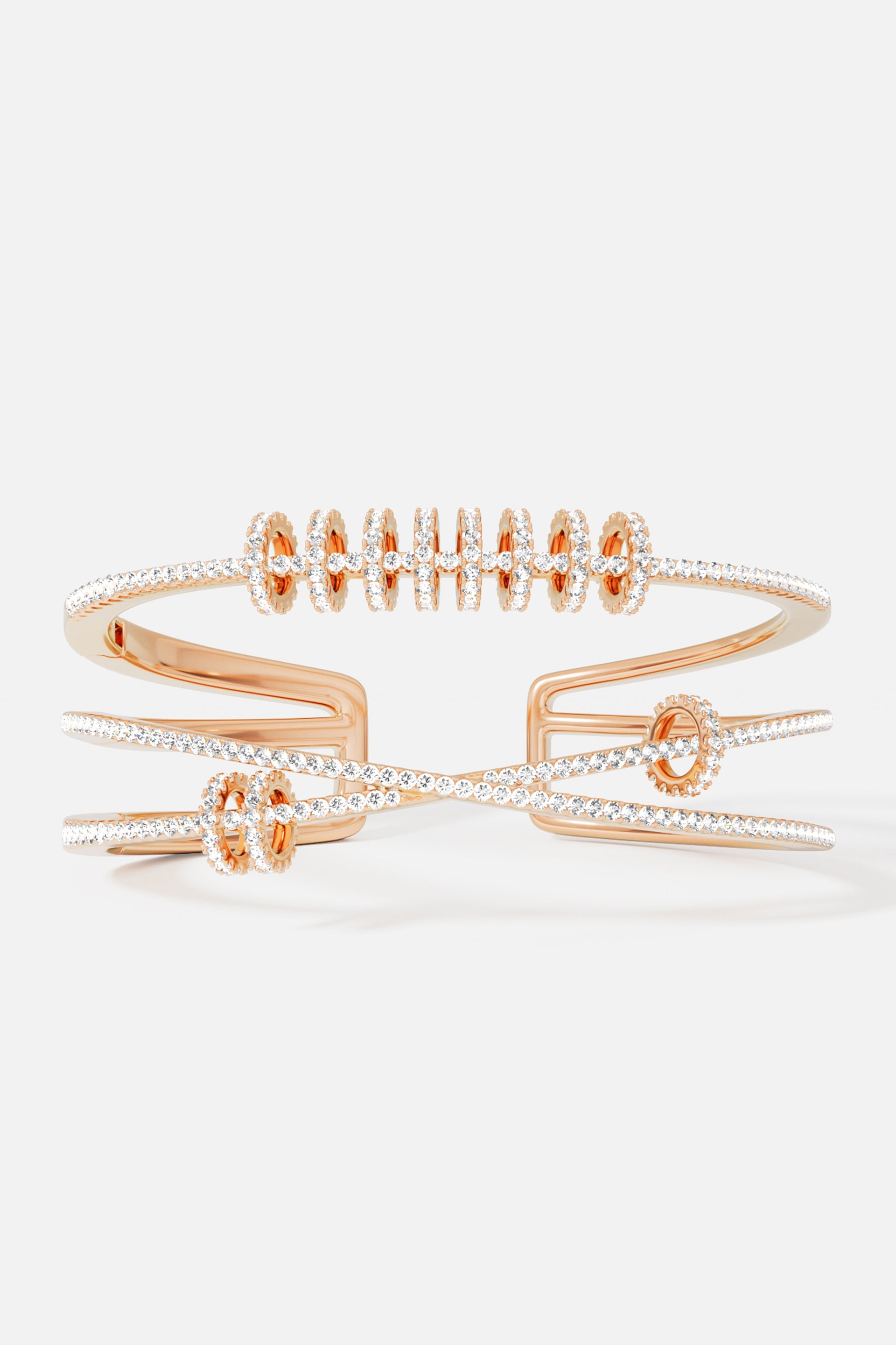 Bracelets APM Monaco gold triple open cuff with sliding rings and crystal accents.