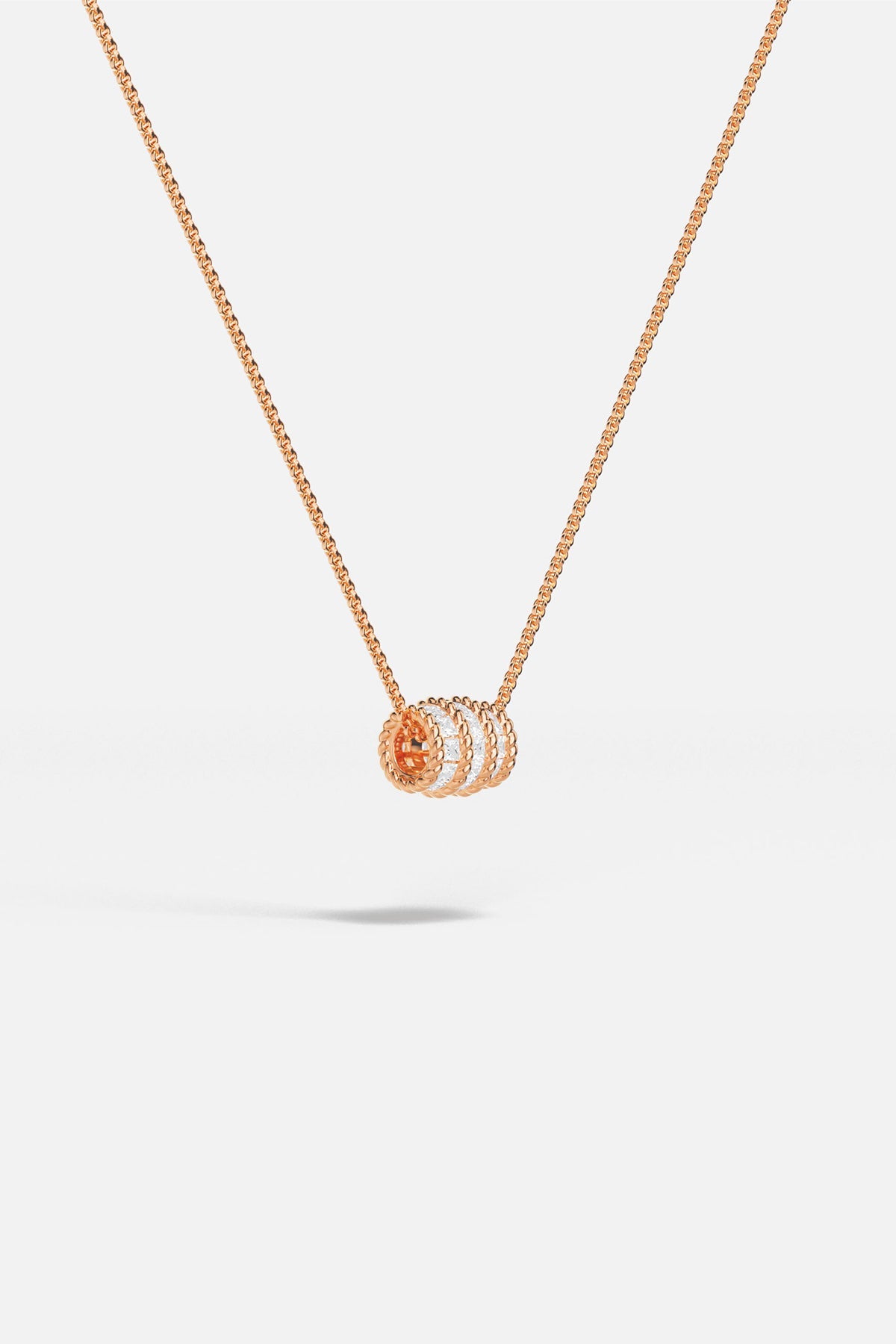 APM MONACO Torsade Adjustable necklace in rose gold on white background