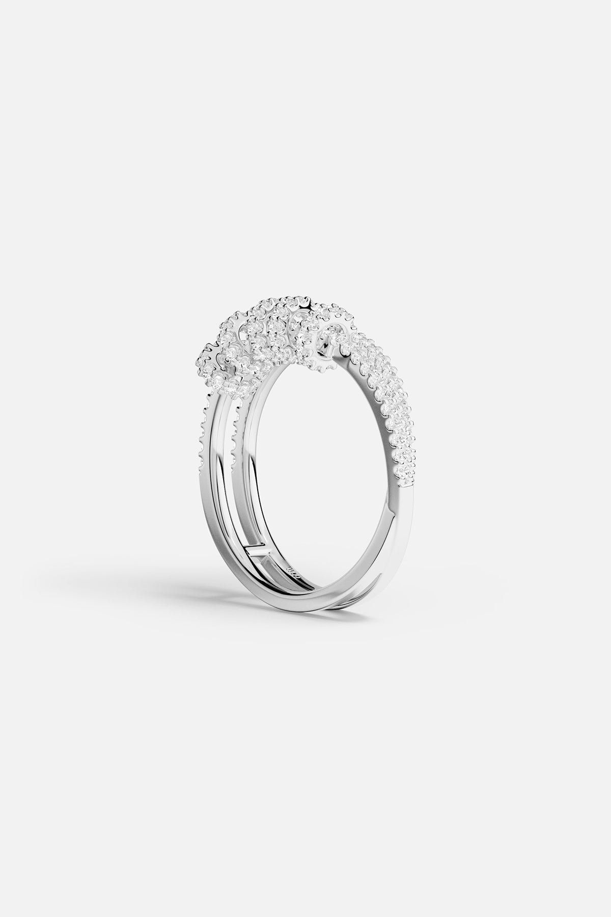 APM Monaco white gold double-ring with sliding hoops and pavé stones.