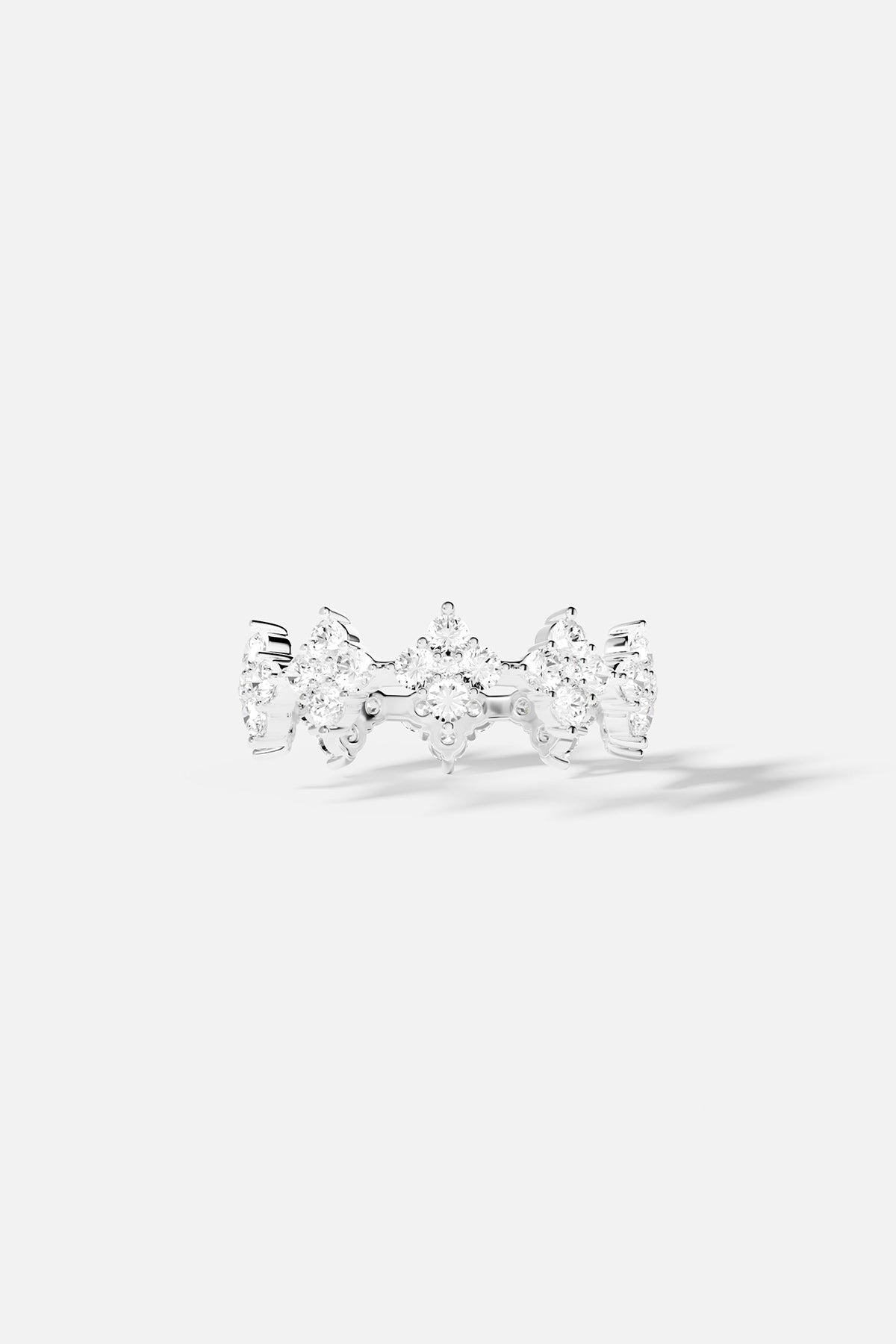Rings APM Monaco fashion jewelry; pavé ring with clear white stones on a metal band.