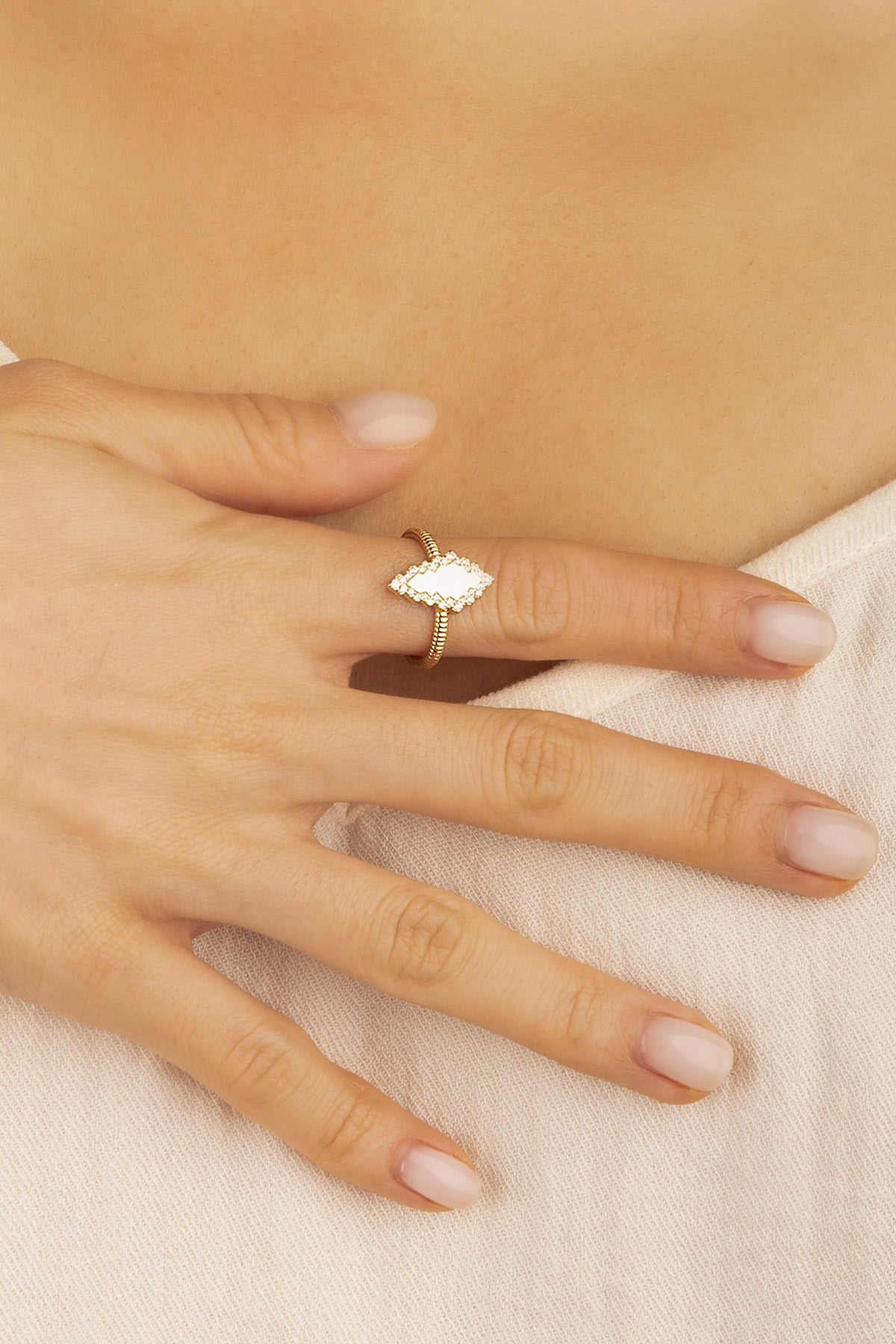APM Monaco Pavé Éclat Ring in Yellow Gold worn on hand